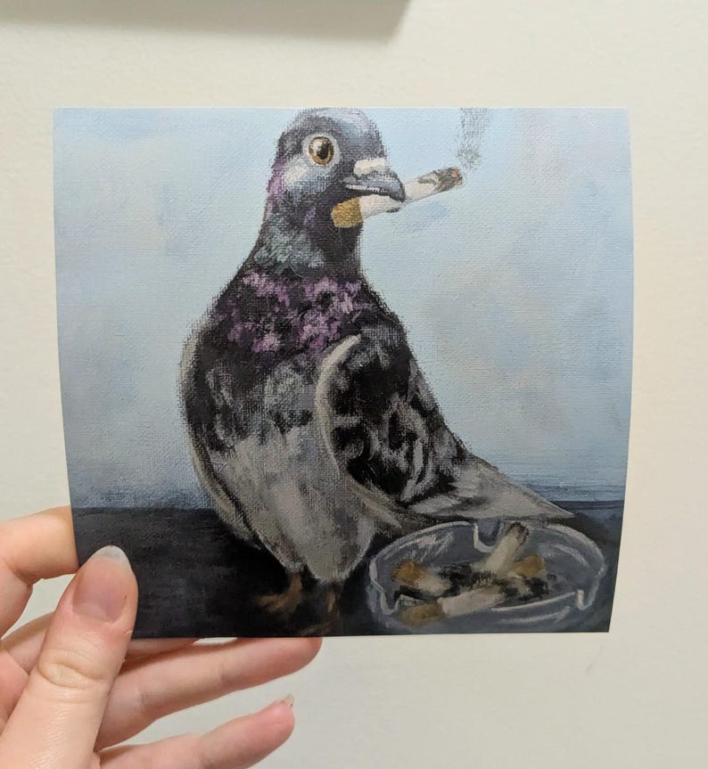 May include: A square painting depicts a pigeon with a cigarette in its beak, smoke rising. The bird has gray, black, and purple feathers. An ashtray with cigarette butts sits below. The background is a light blue.