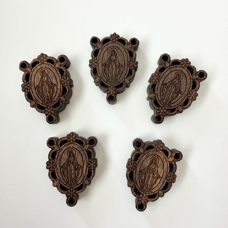 Catholic Jewelry Component Walnut Wood Centerpiece Miraculous Medal Guadalupe Design Laser Engraved Rosary Making Supply Natural Wood Oval Frame Floral Border Detail Prayer Bead Center Piece Chaplet Assembly Material Religious Craft