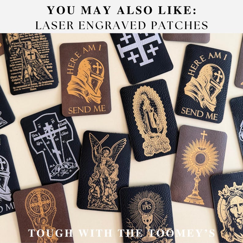 May include: A collection of laser-engraved patches in various shapes and colors. The patches feature religious imagery, including crosses, angels, and saints. Some patches have the text "HERE AM I SEND ME" and "TOUGH WITH THE TOOMEY'S".