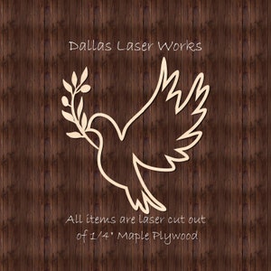 May include: A laser cut wooden dove with an olive branch in its beak. The dove is a symbol of peace and is made of 1/4 inch maple plywood. The text "Dallas Laser Works" is at the top of the image and the text "All items are laser cut out of 1/4" Maple Plywood" is at the bottom of the image.