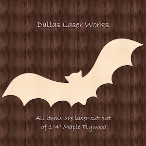 May include: A wooden bat cutout, laser cut from 1/4 inch maple plywood. The bat is flying with its wings spread wide. The text "Dallas Laser Works" is at the top of the image. The text "All items are laser cut out of 1/4" Maple Plywood" is at the bottom of the image.