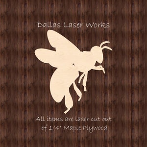 May include: A laser cut wooden bee cutout, made from 1/4 inch maple plywood. The bee is in flight with its wings spread out. The text "Dallas Laser Works" is at the top of the image and the text "All items are laser cut out of 1/4" Maple Plywood" is at the bottom of the image.