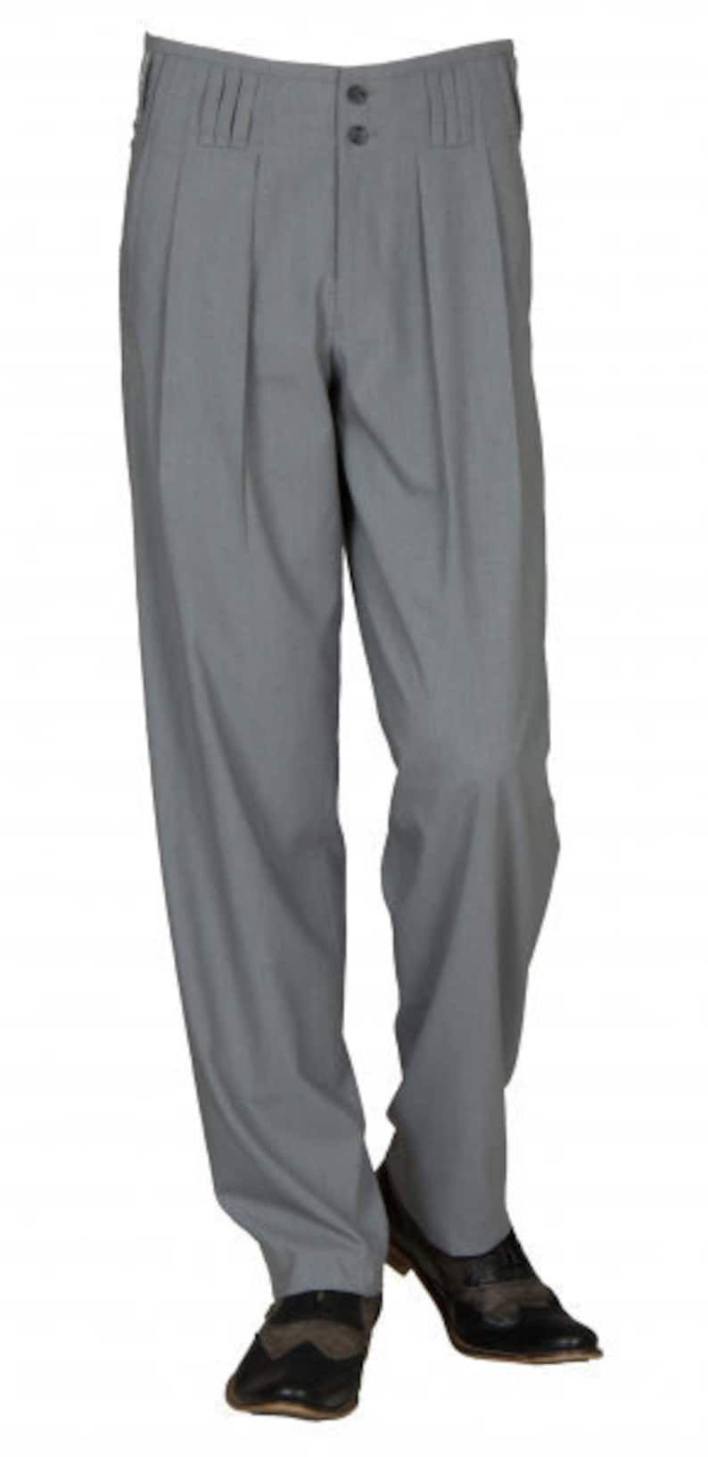 Vintage Style Menswear UK 1920s, 1930s, 1940s, 1950s, 1960s, 1970s Pleated pants in gray model Boogie Retro Vintage Style Waistband pants in grey model boogie retro vintage style business suit pants in cotton blend with extra wide cut leg. $91.69 AT vintagedancer.com