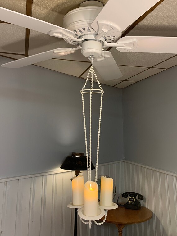 Hanging candle holders from ceiling outlet