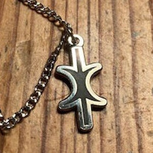 Hand of Eris pendant