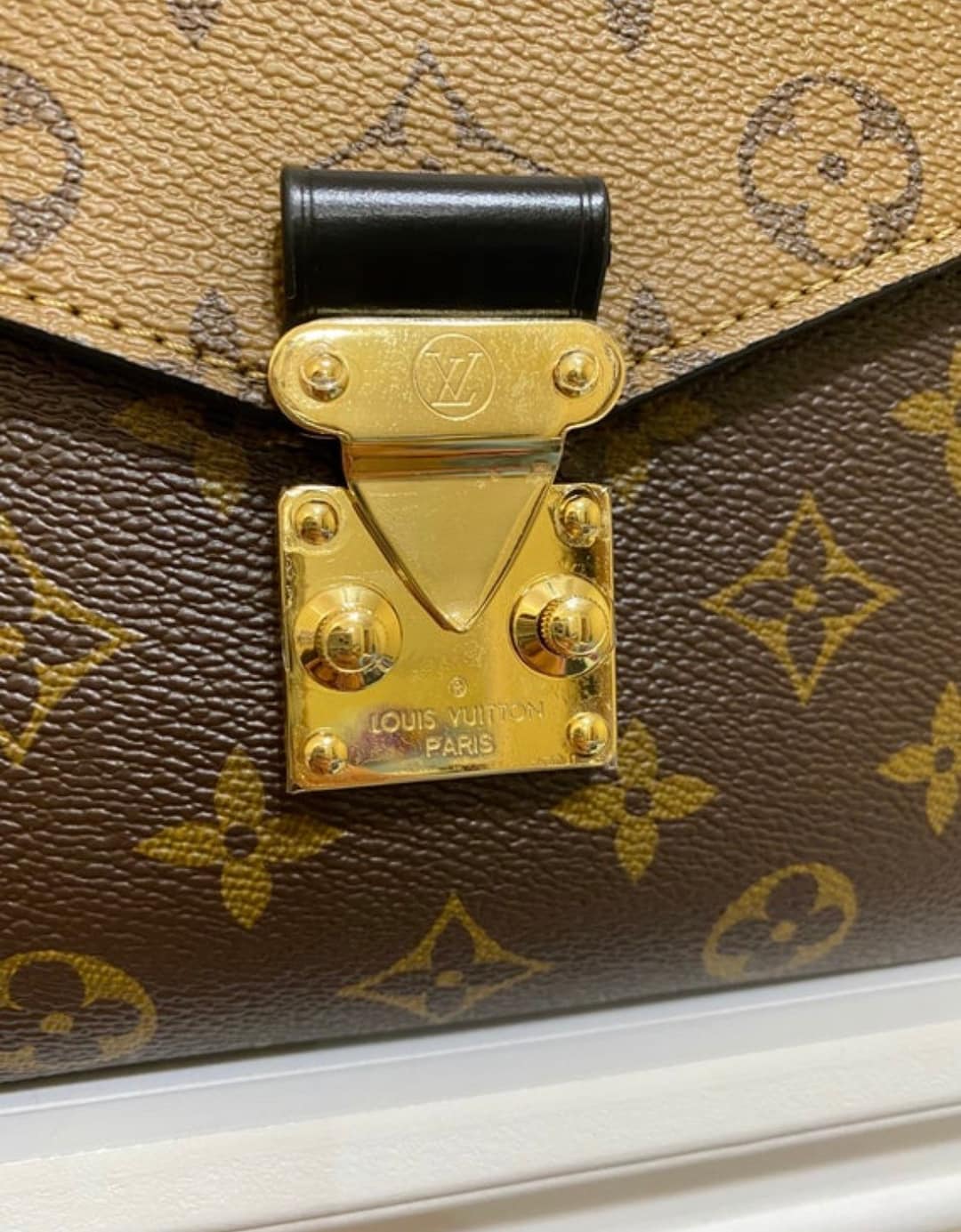 Protezione hardware per Louis Vuitton Pochette Métis Italia
