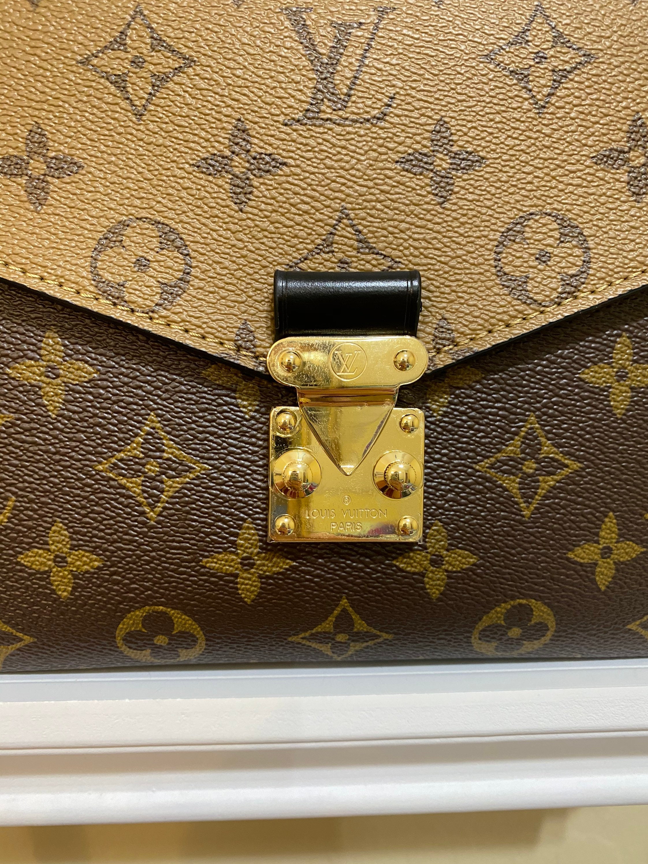 pochette metis crooked lock