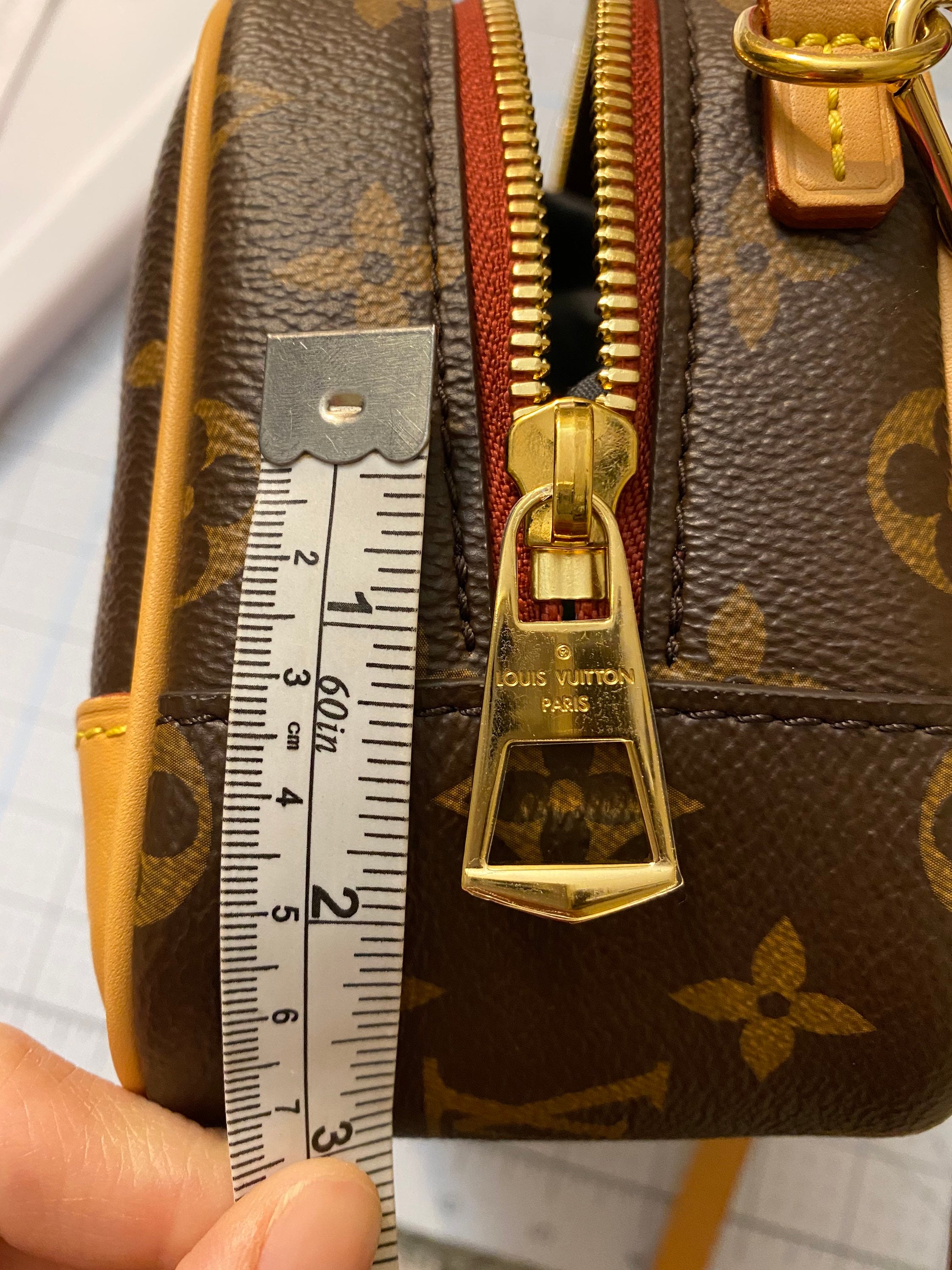 Large “Made in France” Louis Vuitton Zipper Pull