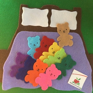 10 little teddys jumping on the bed or ten sleeping teddys and the little one said roll over. Classic anytime felt story. Teaching resource.