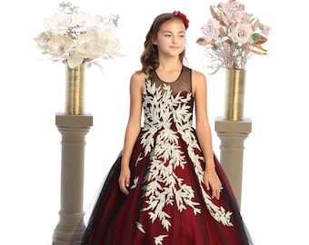 Beautiful burgundy and black dress for girls with train and a buttoned back closure.