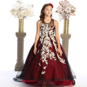 Beautiful burgundy and black dress for girls with train and a buttoned back closure. image 1