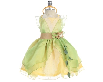 May include: A yellow and green princess costume with a brown belt and a flower accent. The dress has a tulle skirt and a sheer bodice.