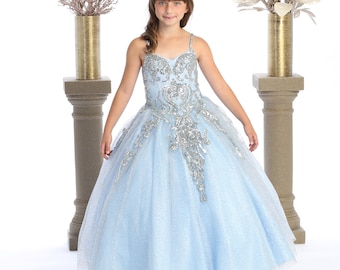 Baby blue glitter dress with silver sequins for pageants and special events .