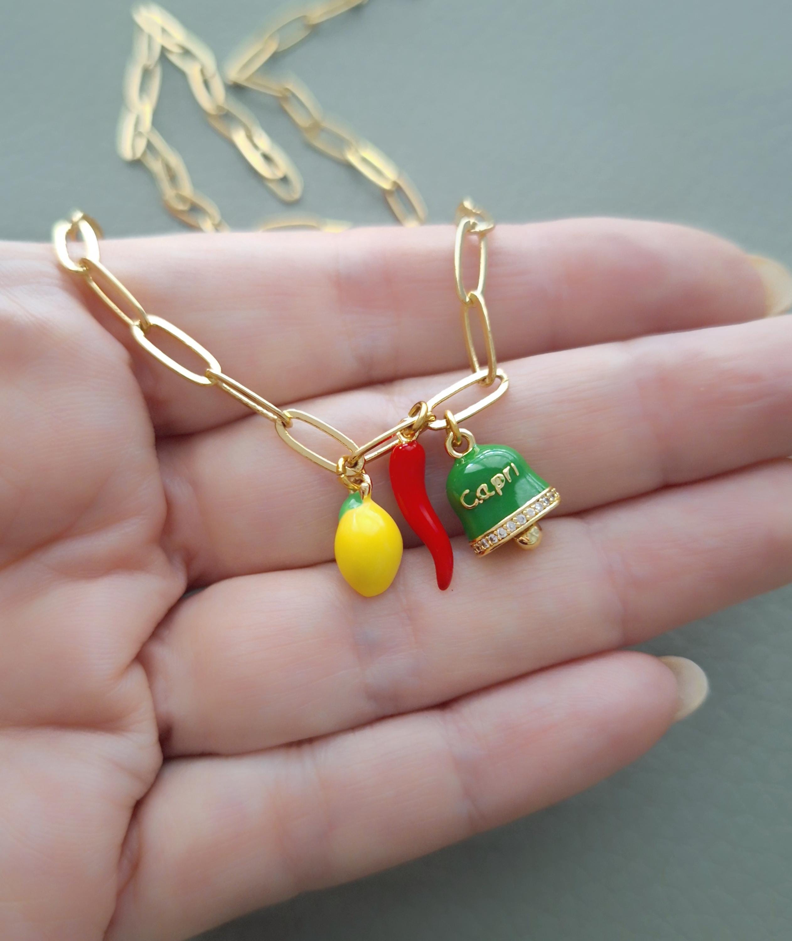 【loro】corno necklace gold Amazon.com: 14K Yellow Gold Cornicello Italian Horn Necklace