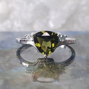 Moldavite Beauty in Simplicity Ring with 7mm faceted Moldavite and cubic zirconia