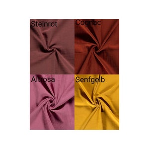 May include: Four fabric swatches in different colors:  Steinrot (burgundy), Cognac (brown), Altrose (pink), and Senfgelb (yellow).