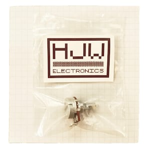 May include: A small electronic component, a potentiometer, is packaged in a clear plastic bag. The bag has a white label with the text "HJW ELECTRONICS" in a brown font. The potentiometer has a metal body and a red wire.