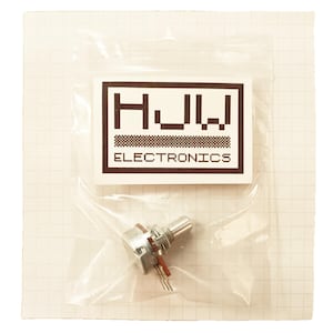 May include: A small electronic potentiometer component in a clear plastic bag. The component has a metal body, a rotating shaft, and three pins. The bag has a white label with the text "HJW ELECTRONICS". The background is a grid pattern.