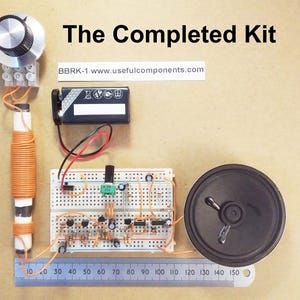 May include: An assembled electronics kit with a speaker, circuit board, battery, and coil. The kit includes a ruler for measurement. Text on the image reads "The Completed Kit" and "BBRK-1 www.usefulcomponents.com".