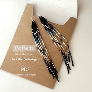May include: A pair of beaded earrings with a fringe design. The earrings feature black, white, blue, and tan beads. The earrings are displayed on a brown paper background. The text on the paper reads "Pattern", "Beaded earrings", "Brick stitch with fringe", "PDF", and "Instanat download".