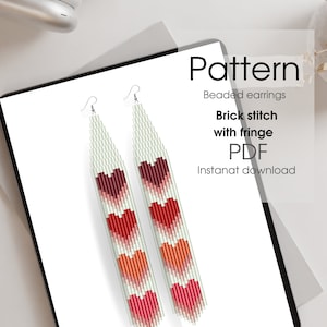 May include: A digital download pattern for beaded earrings. The earrings are long and feature a brick stitch design with fringe. The pattern includes hearts in shades of red, pink, and white.