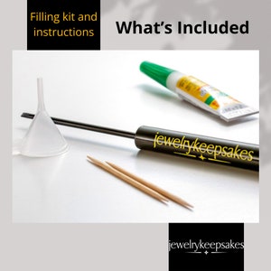 May include: A close-up of a jewelry keepsake filling kit. The kit includes a small funnel, two toothpicks, and a tube of glue. The tube of glue is labeled "jewelrykeepsakes".