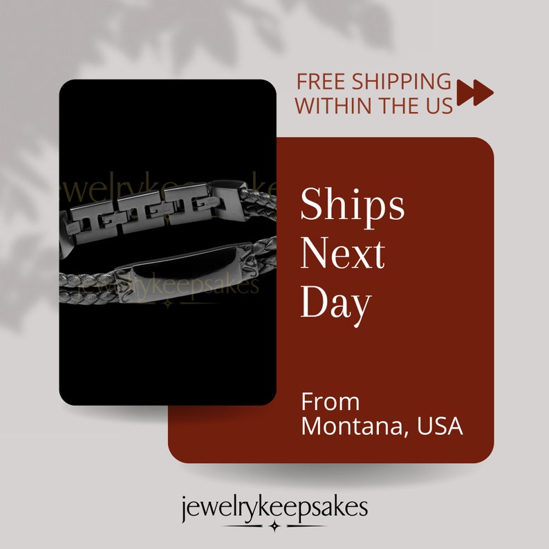 May include: Black leather bracelet with a silver metal clasp. The bracelet is braided and has a rectangular metal plate with the text "jewelrykeepsakes" on it.