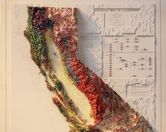 May include: A vintage geological map of California, showing the state's diverse terrain in shades of red, green, yellow, and brown. The map includes a legend with color-coded geological formations and a title that reads "GEOLOGIC MAP OF CALIFORNIA".