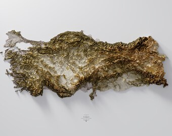 May include: A 3D topographic map of Turkey, rendered in shades of gold and brown, with a white background. The map shows the country's mountainous terrain and coastal areas.