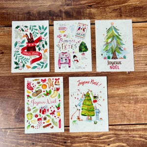 Handmade Merry Christmas card illustrated in watercolor