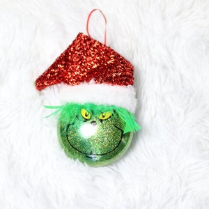 Ornement scintillant inspiré du Grinch Grinch avec fourrure