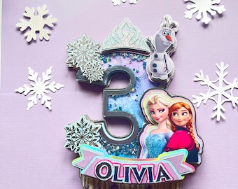 Topo de bolo artesanal Frozen, decoração de festa da Elsa e da Anna.