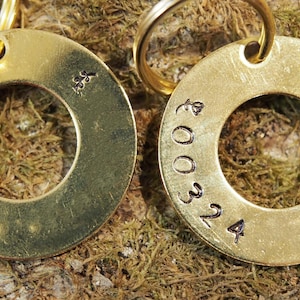 Phone number on ring with extra hole