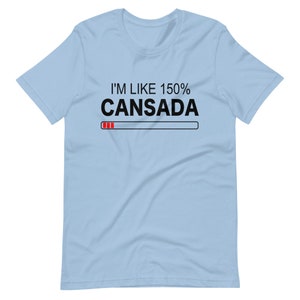 May include: Light blue t-shirt with black text that reads "I'm like 150% Cansada" with a red progress bar underneath.