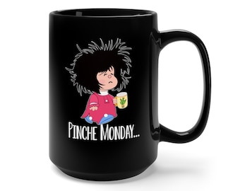 May include: Black ceramic coffee mug with a cartoon character holding a cup of coffee. The text "PINCHE MONDAY..." is printed on the mug.
