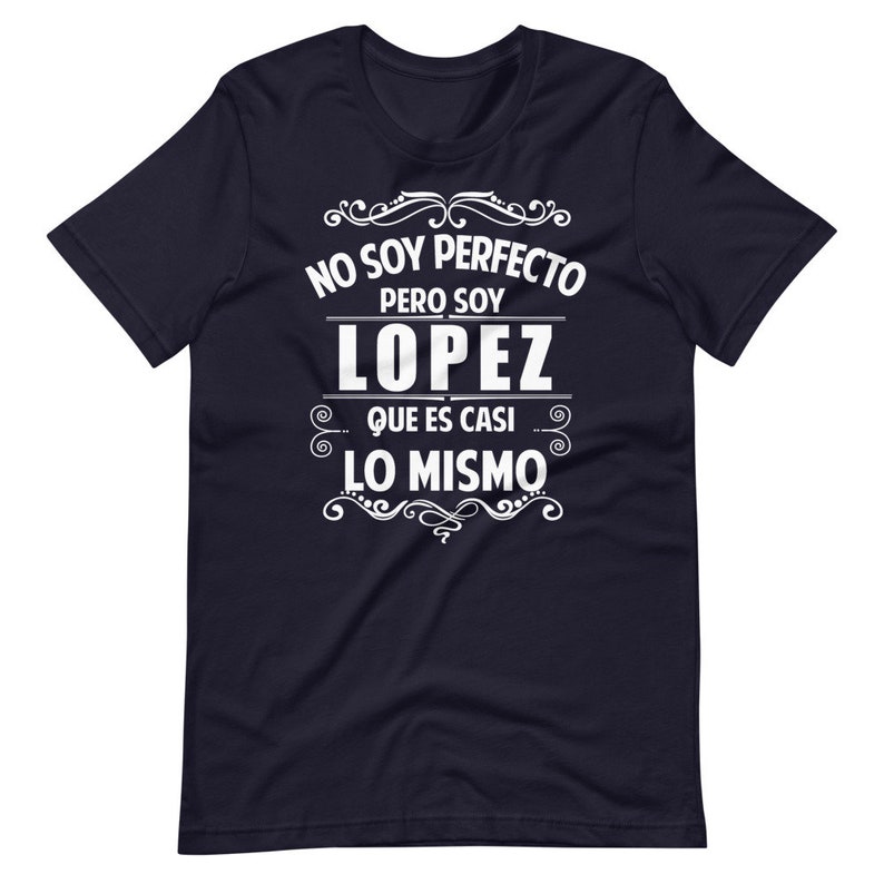 May include: Navy blue t-shirt with white text that reads "No soy perfecto pero soy Lopez que es casi lo mismo".