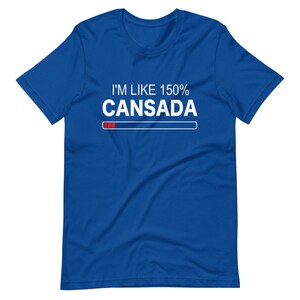 May include: A royal blue t-shirt with white text that reads "I'm like 150% Cansada" with a progress bar underneath. The progress bar is mostly filled in with red.
