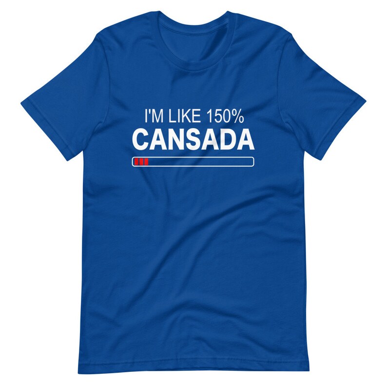 May include: A royal blue t-shirt with white text that reads "I'm like 150% Cansada" with a progress bar underneath. The progress bar is mostly filled in with red.