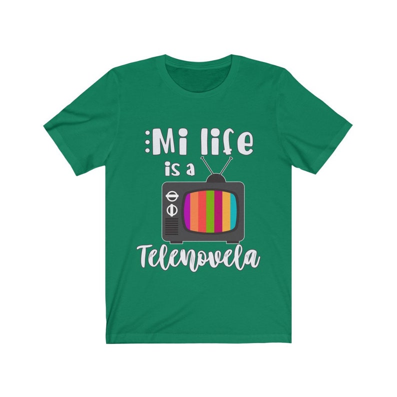 May include: A green t-shirt with a white graphic of a retro television with the text "Mi life is a Telenovela".