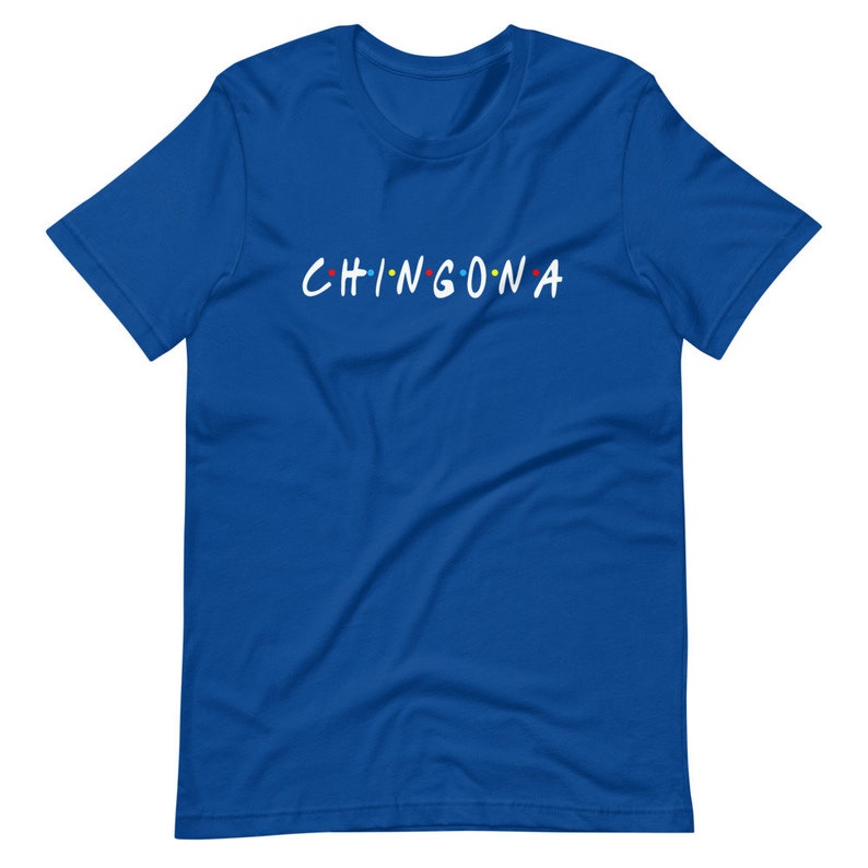 May include: A royal blue t-shirt with the text "CHINGONA" in white letters with colorful dots above each letter.