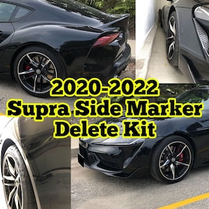 Può includere: Auto sportiva nera con pinze freno rosse e cerchi neri. L'immagine include il testo "2020-2022 Supra Side Marker Delete Kit". L'auto ha uno spoiler ed è parcheggiata su una superficie pavimentata.