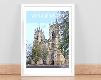 May include: A framed print of York Minster, a large cathedral with two tall towers. The print has a light blue background with the text "YORK MINSTER" at the top.