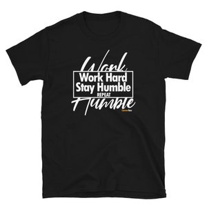 May include: Black short-sleeved t-shirt with white text that reads "Work Hard Stay Humble Repeat Humble".