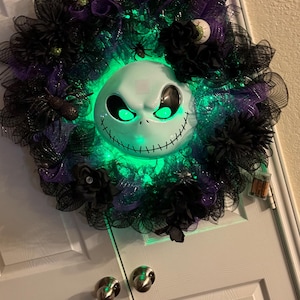 Jack Skellington Wreath with black leaves and  assortments add spiders/ or little Jack