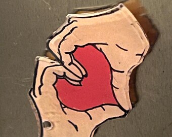 Emoji con imán de corazón