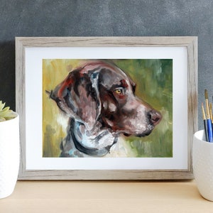 May include: A painting of a brown and white dog with a black collar. The dog is looking to the right and has a green background.