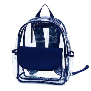 May include: Clear backpack with navy blue accents. The backpack features a clear body with navy blue trim, a front flap, and a top handle. It has a zippered main compartment and a small side pocket. The straps are navy blue.