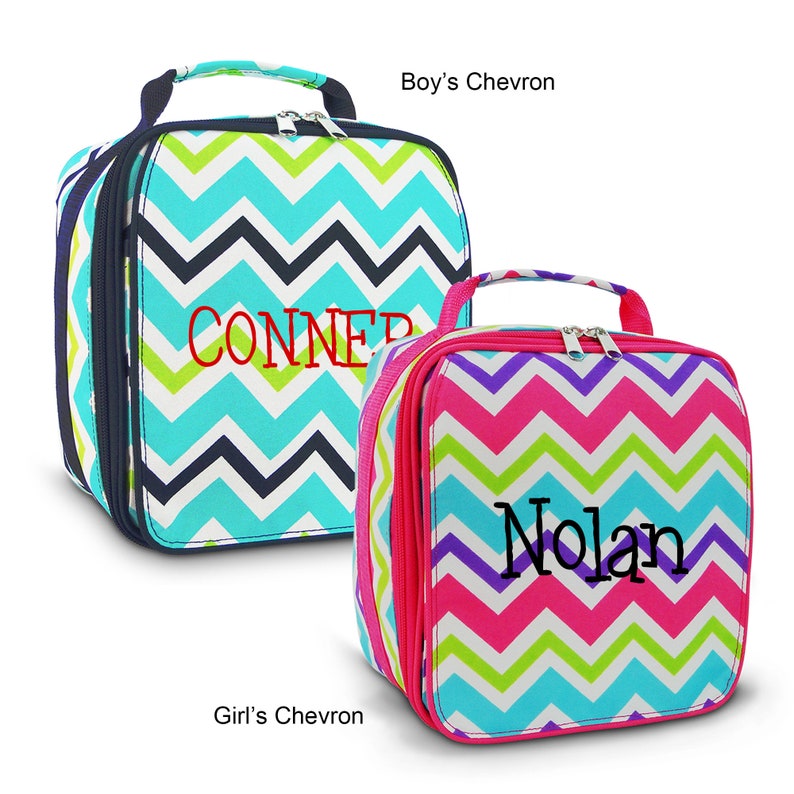 May include: Two personalized lunch bags with chevron patterns. One is teal, navy, and lime green with "CONNER" in red. The other is pink, purple, and lime green with "Nolan" in black. Both have handles and zippers.
