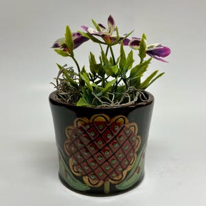 May include: A set of three ceramic mugs with a speckled, matte finish. The mugs are in shades of cream, light gray, and dark gray. Each mug has a simple, minimalist design, perfect for coffee or tea.