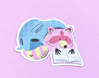 Cute Cozy Raccoon with Book Waterproof Stickers, Book Lovers, Raccoon Lover Gift, Glossy Vinyl Sticker, Raccoon with blanket